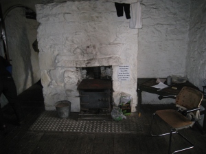 Stove in sitting room at Feshie bothy