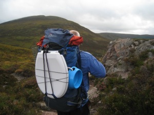 Neil Findlay on way to Corrour Bothy, Cairngorms, with new toilet seat